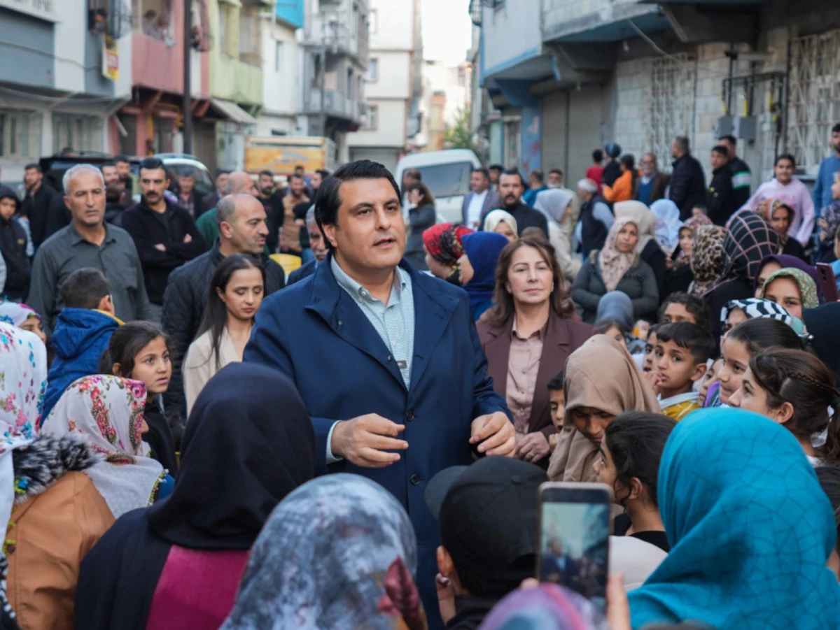 BAŞKAN YILMAZ'IN MAHALLE ZİYARETİ MİTİNGE DÖNÜŞTÜ